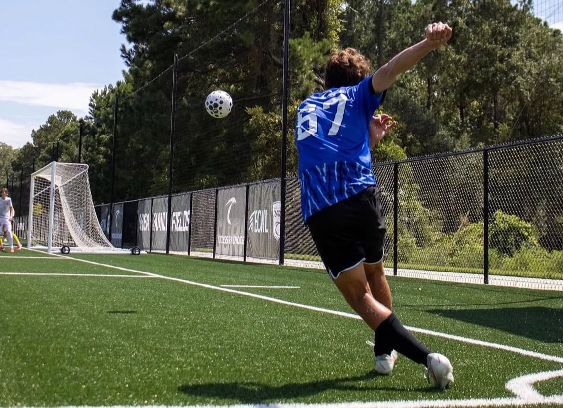 Oliver Sovenyhazy #67 taking a throw-in for South Carolina Surf ECNL